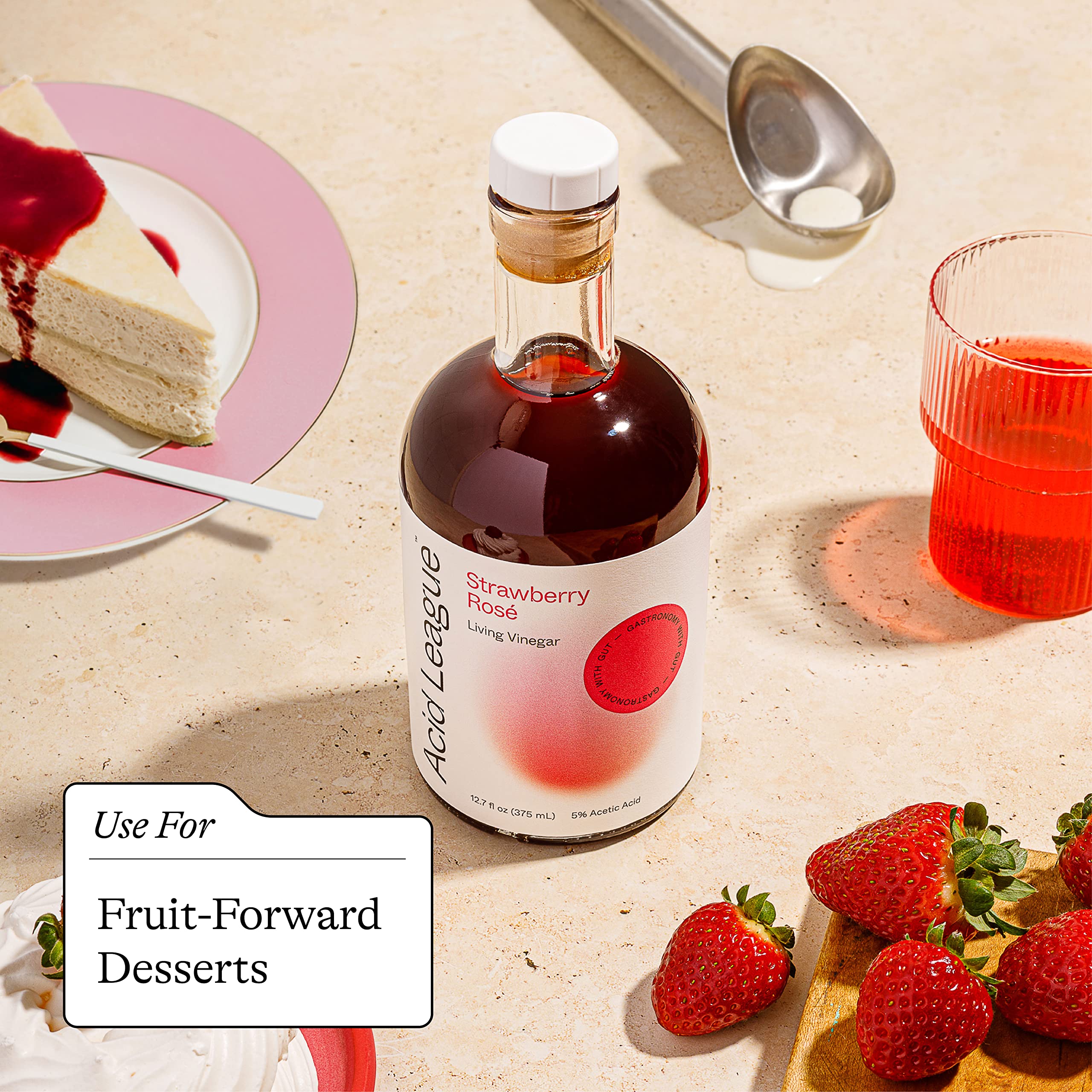 Glass of yogurt with Acid League Strawberry Rosé Living Vinegar drizzle.