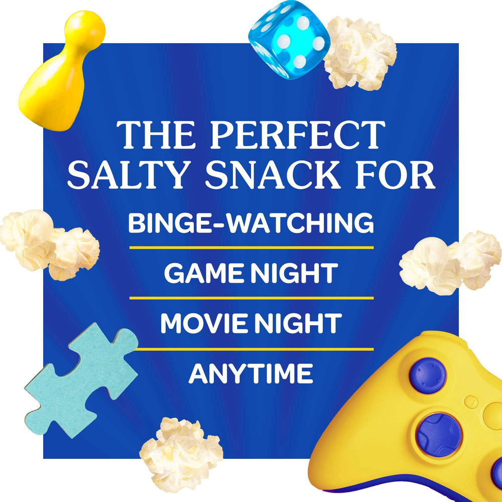 Family enjoying ACT II popcorn during a cozy movie night