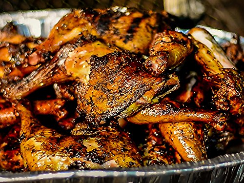 Oven-baked chicken quarters with Adkins rub for a caramelized crust.