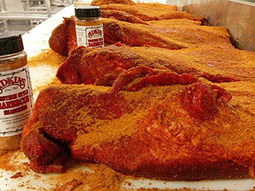 Smoker setup with Adkins seasoning for a smoky Texas-style meal.