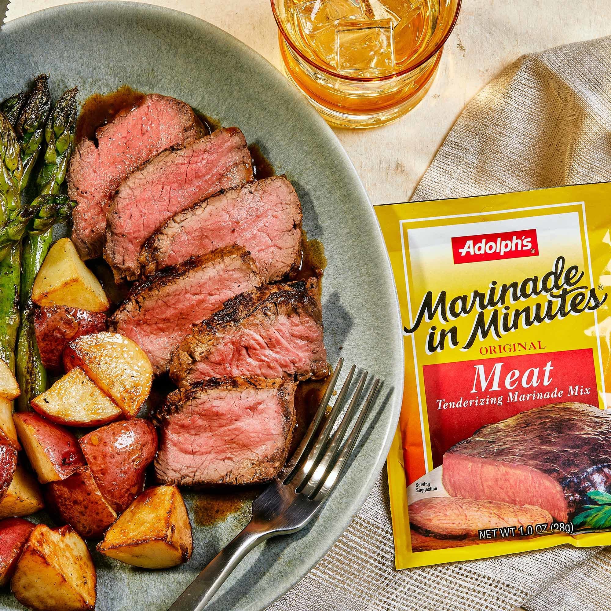 Water mix ready for 15-minute tenderizing with Adolph's Marinade In Minutes
