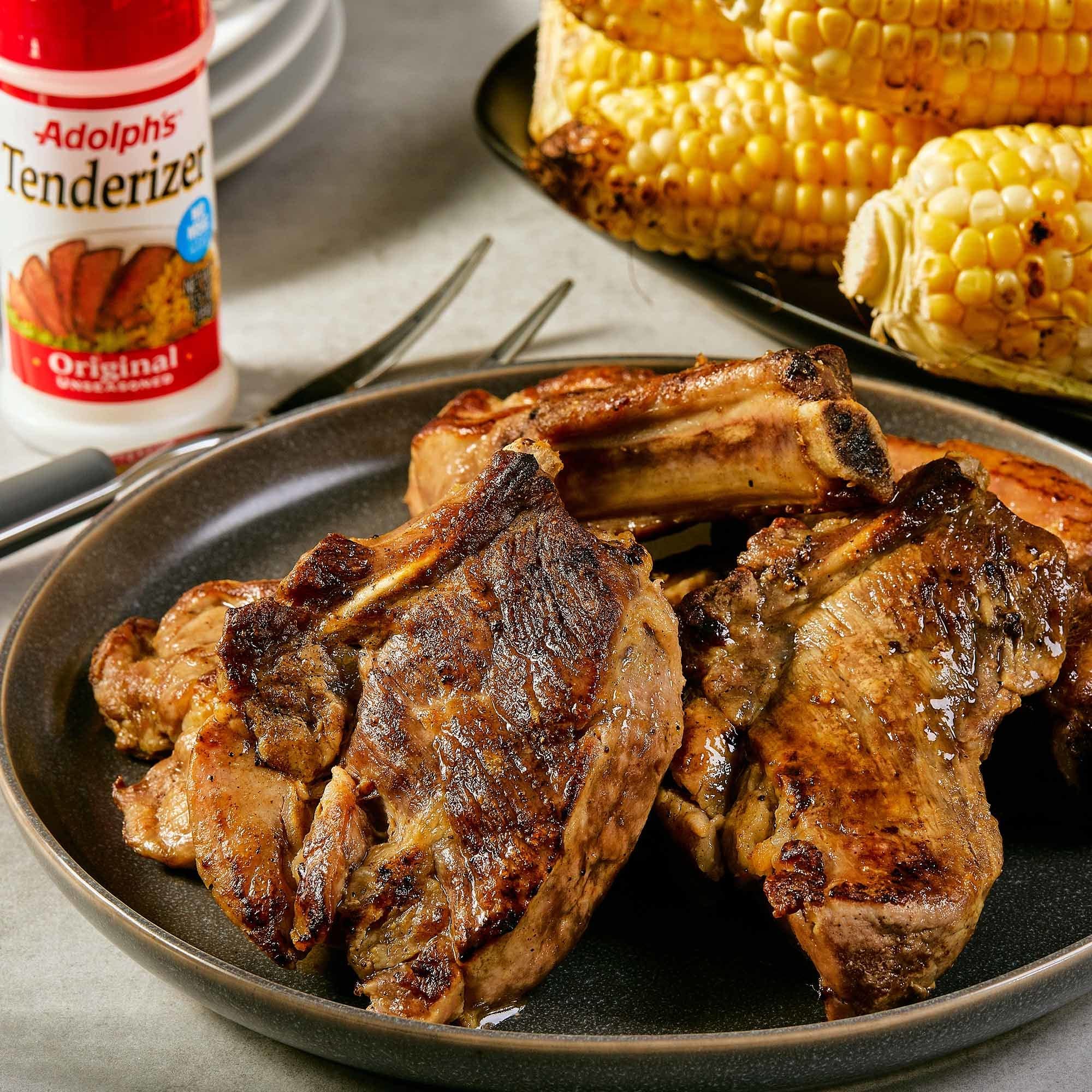 Adolph's tenderizer dusting meat shows even coating for flavorful bites