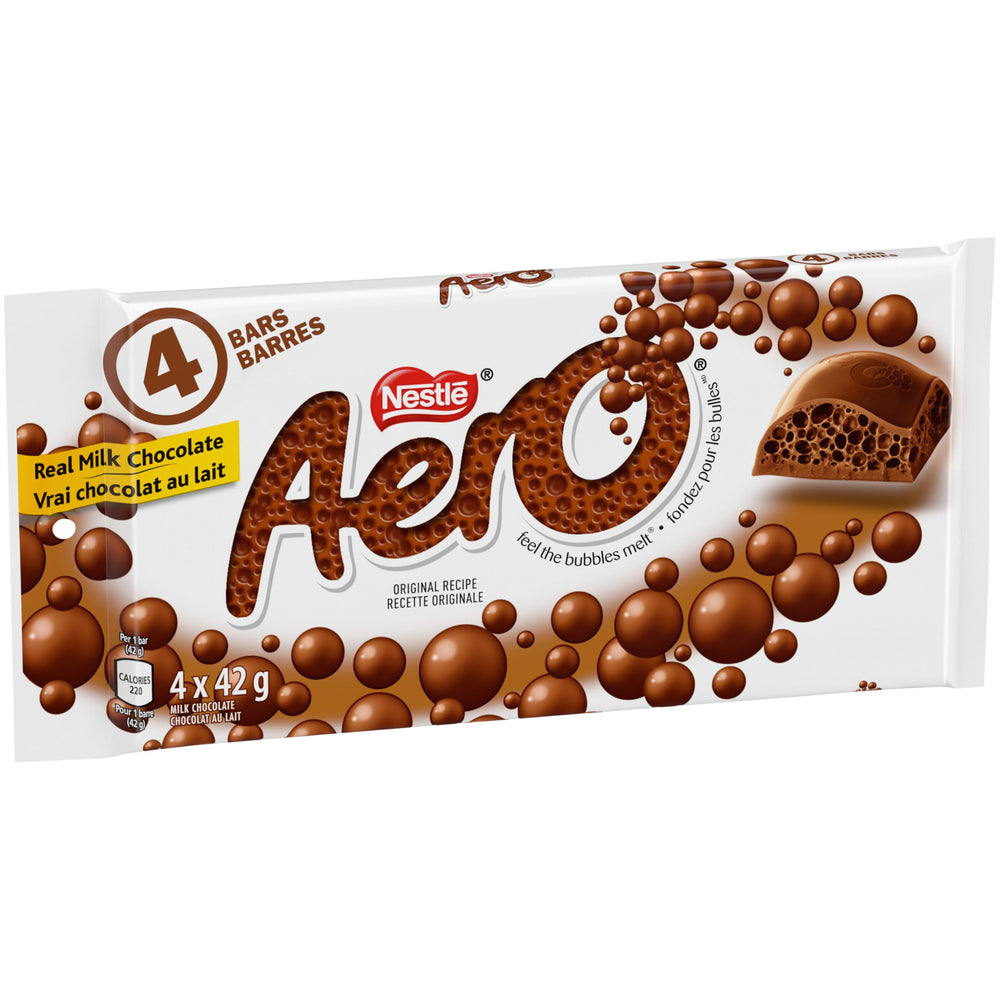 Aero Milk Chocolate bar breaking to reveal signature bubbles.