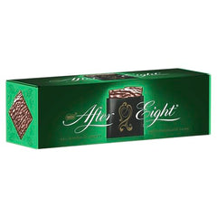 After Eight foil-pack close-up emphasizing elegant golden wrapping and fine chocolates.