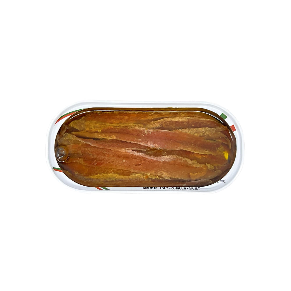 Agostino Recca olive oil glaze on anchovies emphasizes rich umami notes.