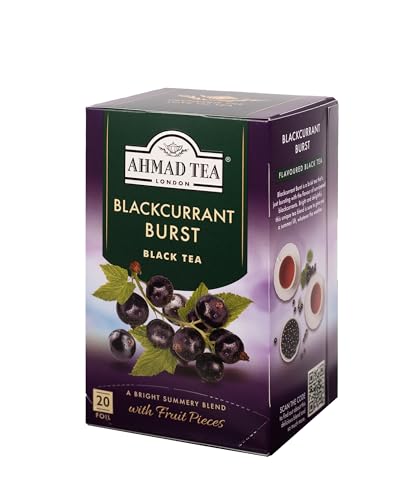 Hot brew of Ahmad Tea Blackcurrant Burst, bright berry aroma.