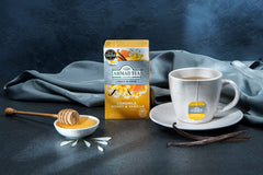 Ahmad Tea Camomile Honey Vanilla hot cup with inviting aroma for relaxation.