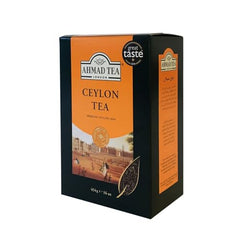 Pouring Ahmad Tea loose-leaf tea for a fresh steep.