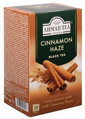 Cup of Ahmad Tea Cinnamon Haze steaming to highlight rich flavor and aroma.