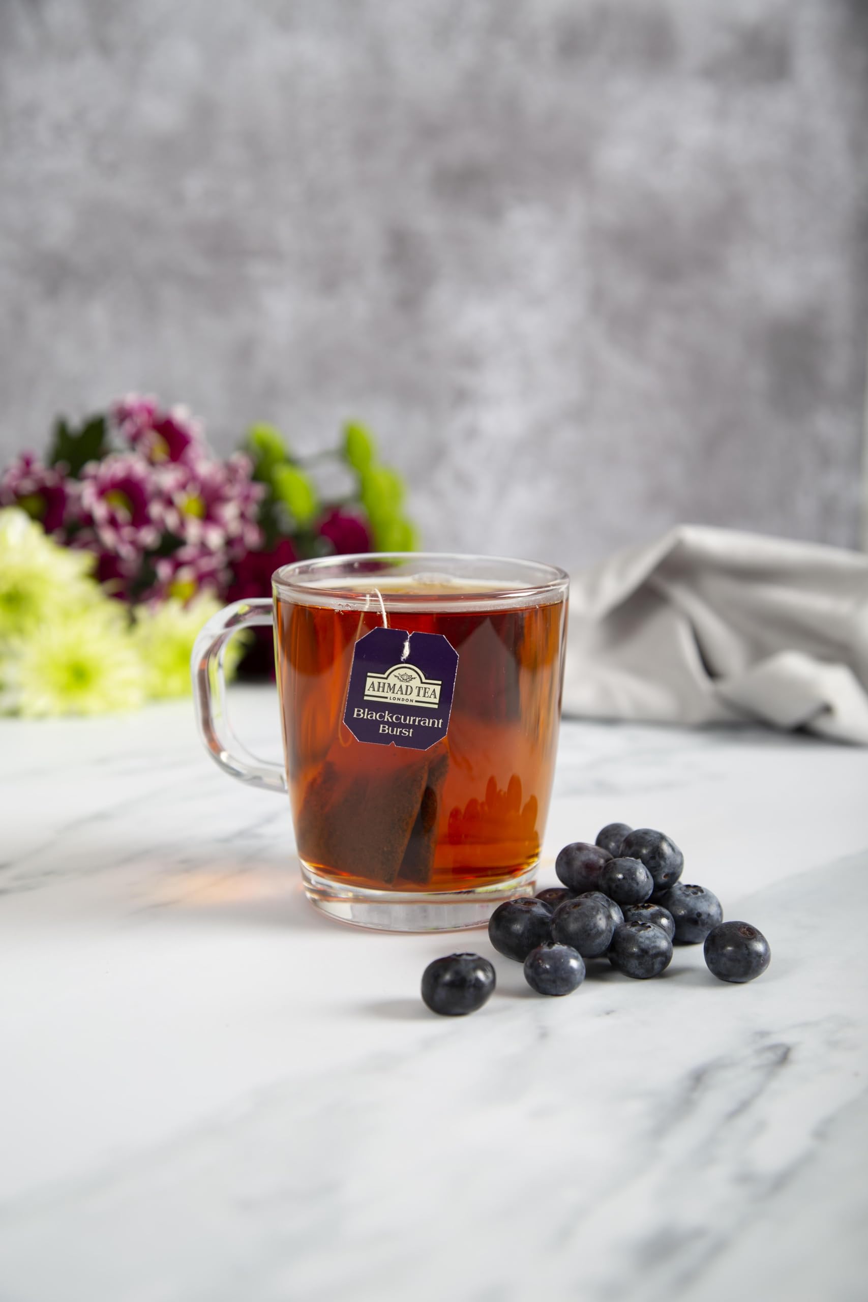 Ethical Tea Partnership badge reflects Ahmad Tea's commitment to responsible sourcing.