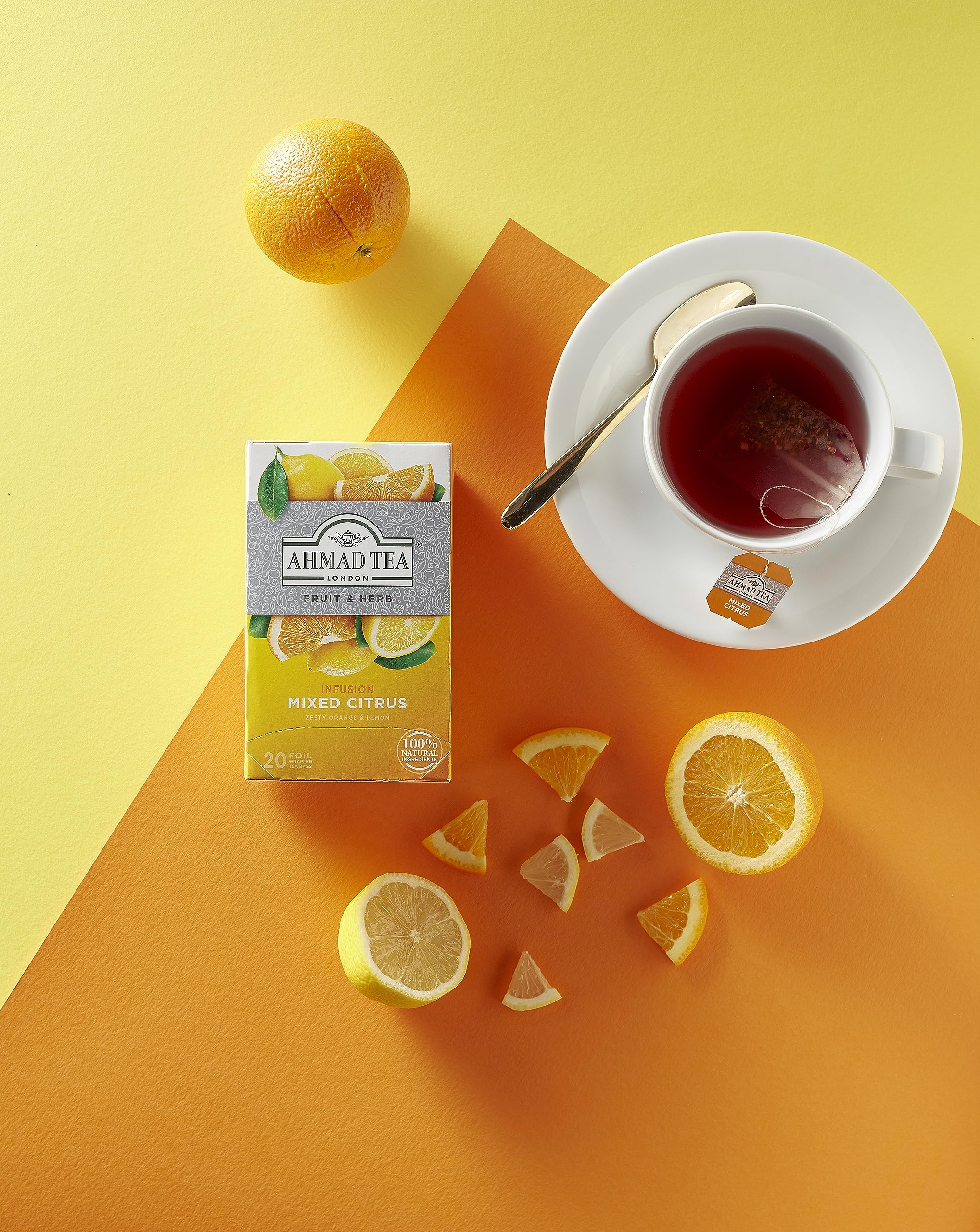 Ahmad Tea Mixed Citrus steam rising as citrus aroma fills the room.