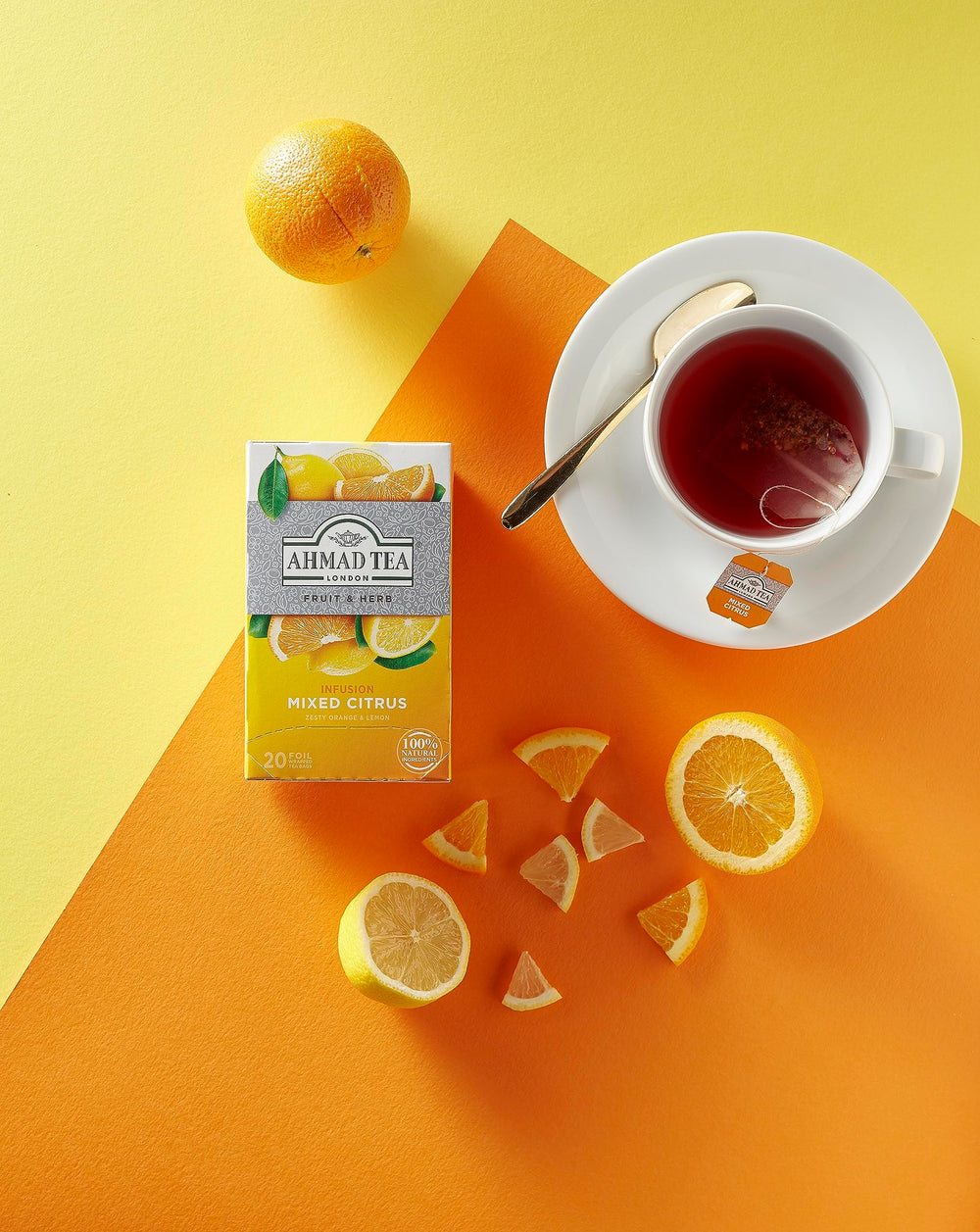 Ahmad Tea Mixed Citrus steam rising as citrus aroma fills the room.