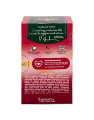 Ahmad Tea Raspberry Indulgence tea bag steeping releasing vibrant fragrance.