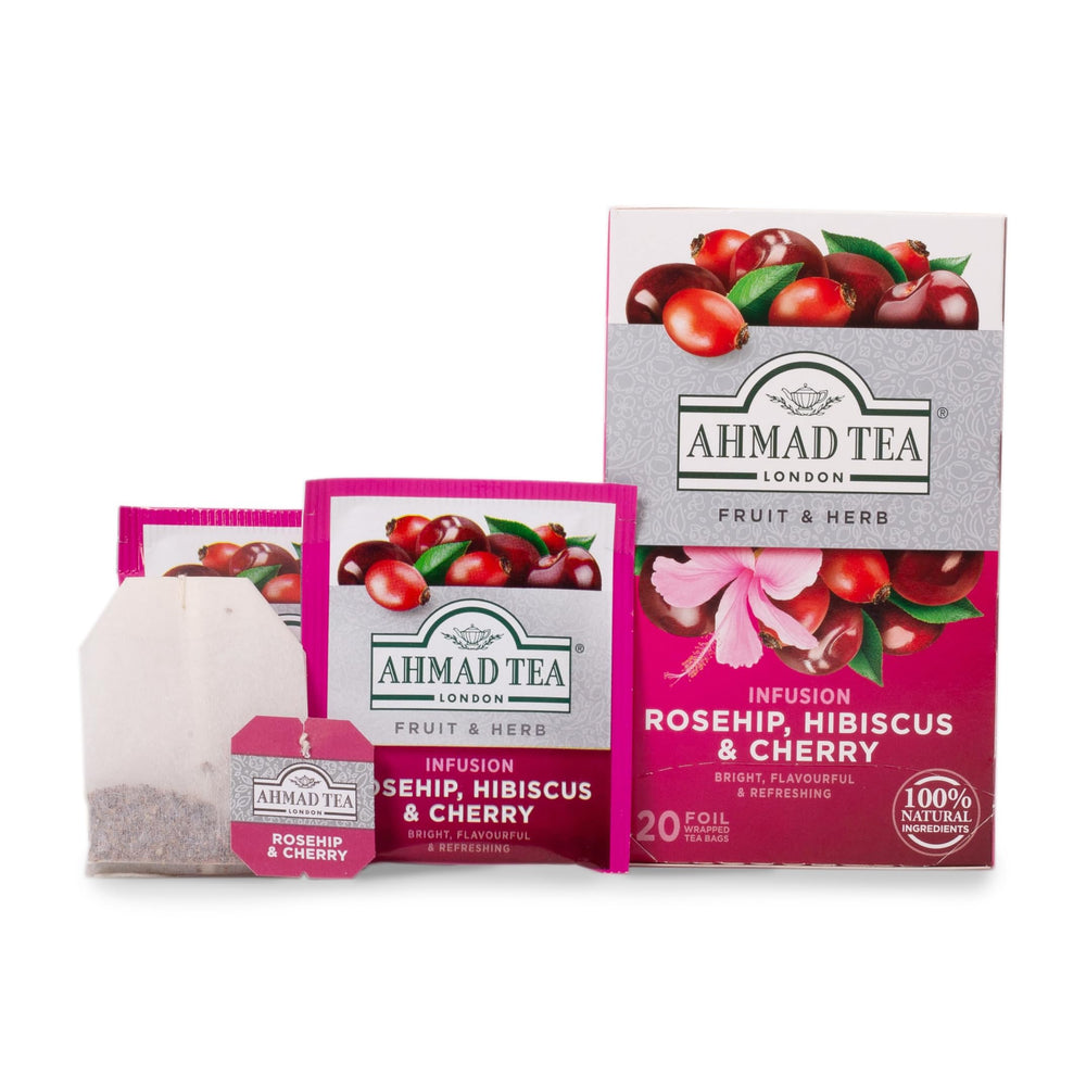 Ahmad Tea rosehip hibiscus cherry infusion in a cup, vibrant color for tea time.