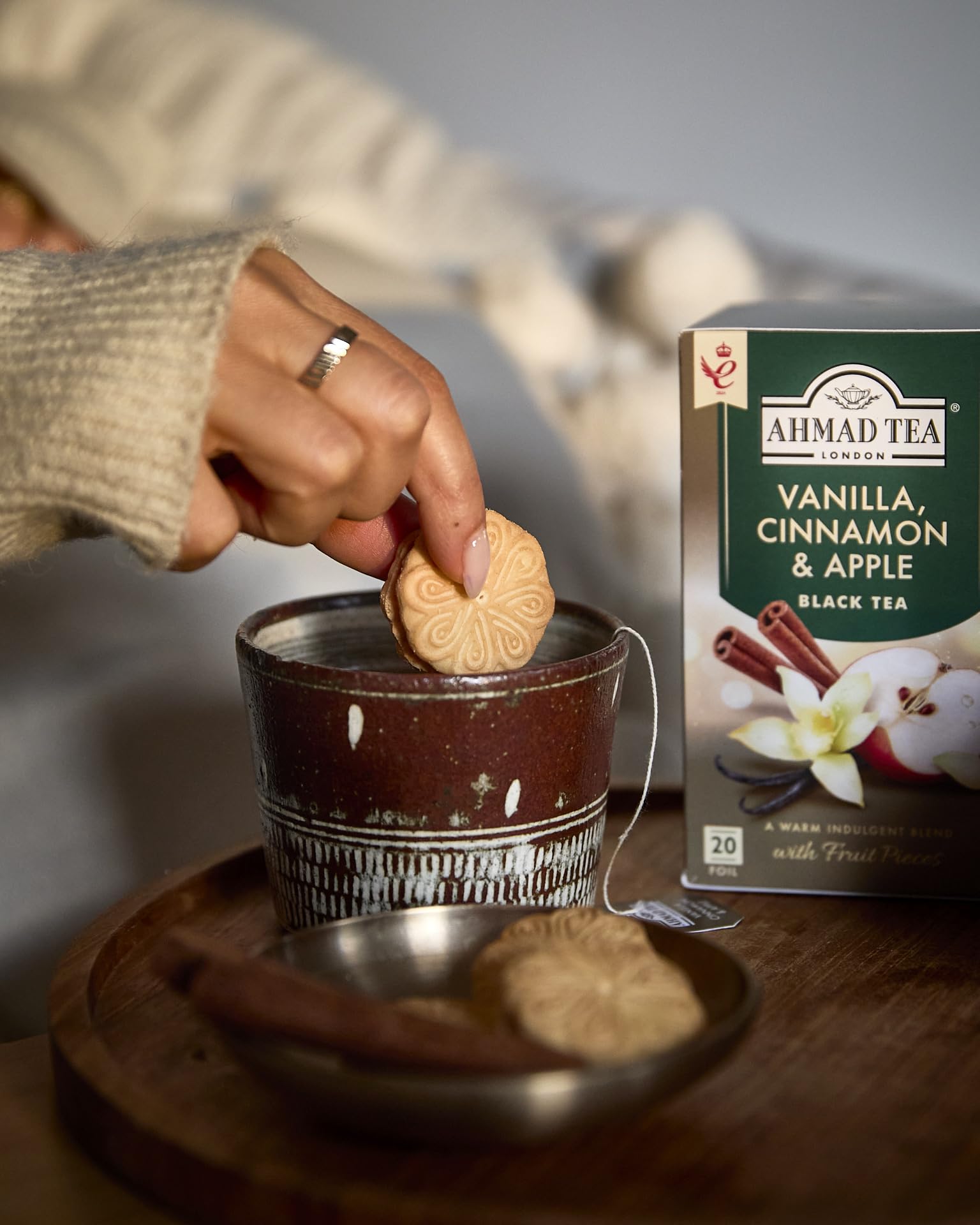 Ahmad Tea Vanilla Cinnamon Apple cinnamon sticks highlight warm spice notes.