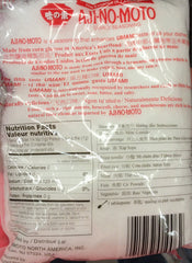 Ajinomoto umami seasoning pour showing even distribution for soups and stir-fries.