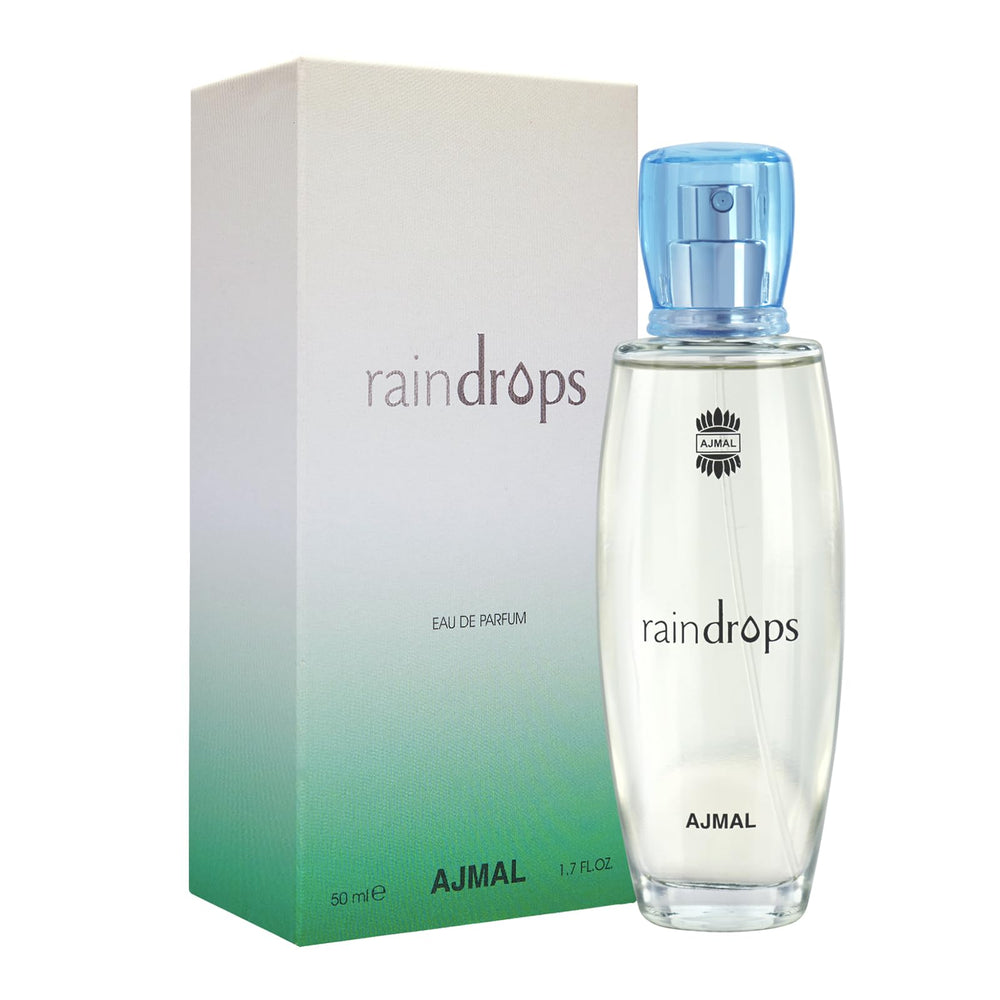 Ajmal Rain Drops spray action demonstrating light lasting scent