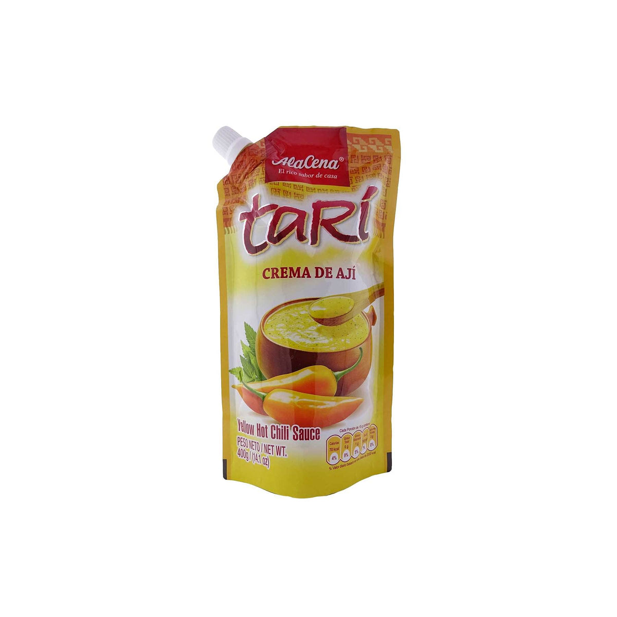 Alacena Crema de Aji Tari bottle pour, creamy Peruvian sauce ideal for drizzling.
