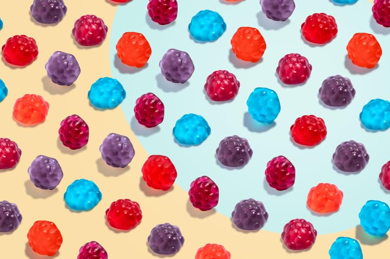 Albanese mixed berry gummies featuring cherry, strawberry, grape, blue raspberry visuals.
