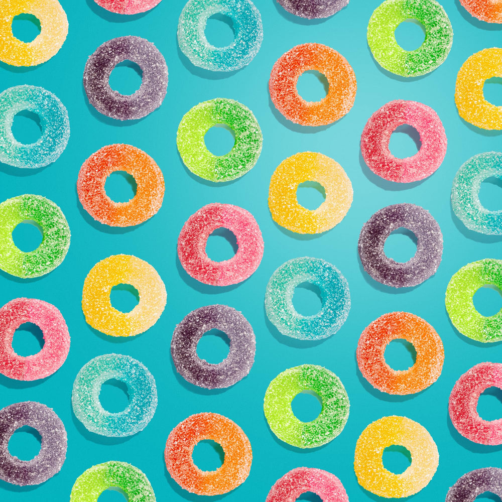Albanese Sour Mini PuckeRings blue raspberry flavor, bold texture for sharing moments.