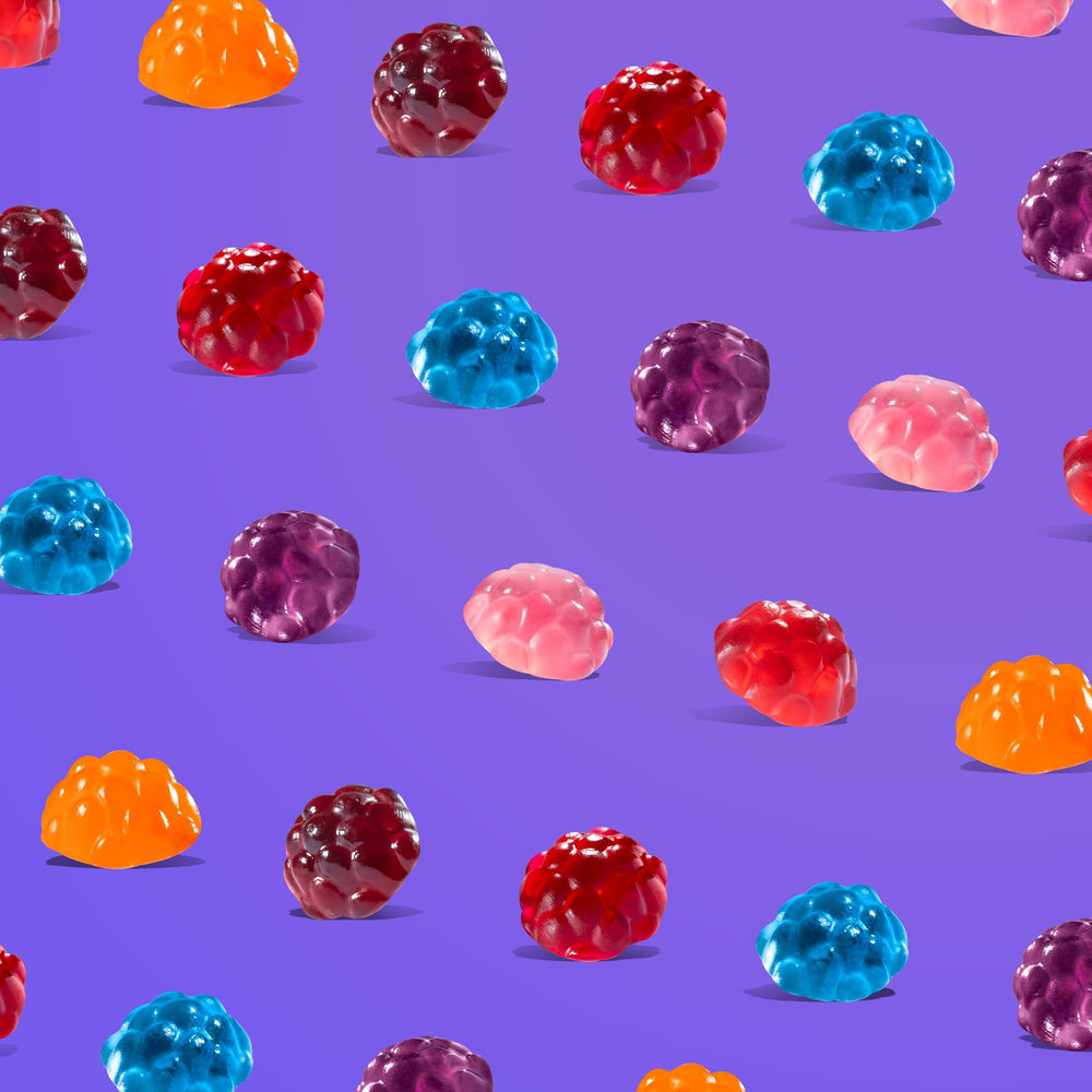 Albanese Raspberry gummies in a bag, bright flavor for kids.