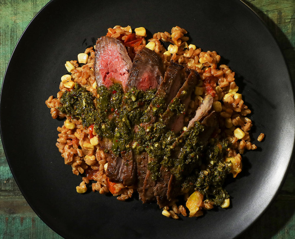 Alessi Autentico farro paired with grilled meat on a plate