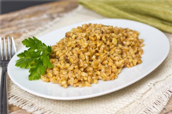 Alessi Autentico porcini-mushroom with farro in pan, releasing earthy aroma and depth.