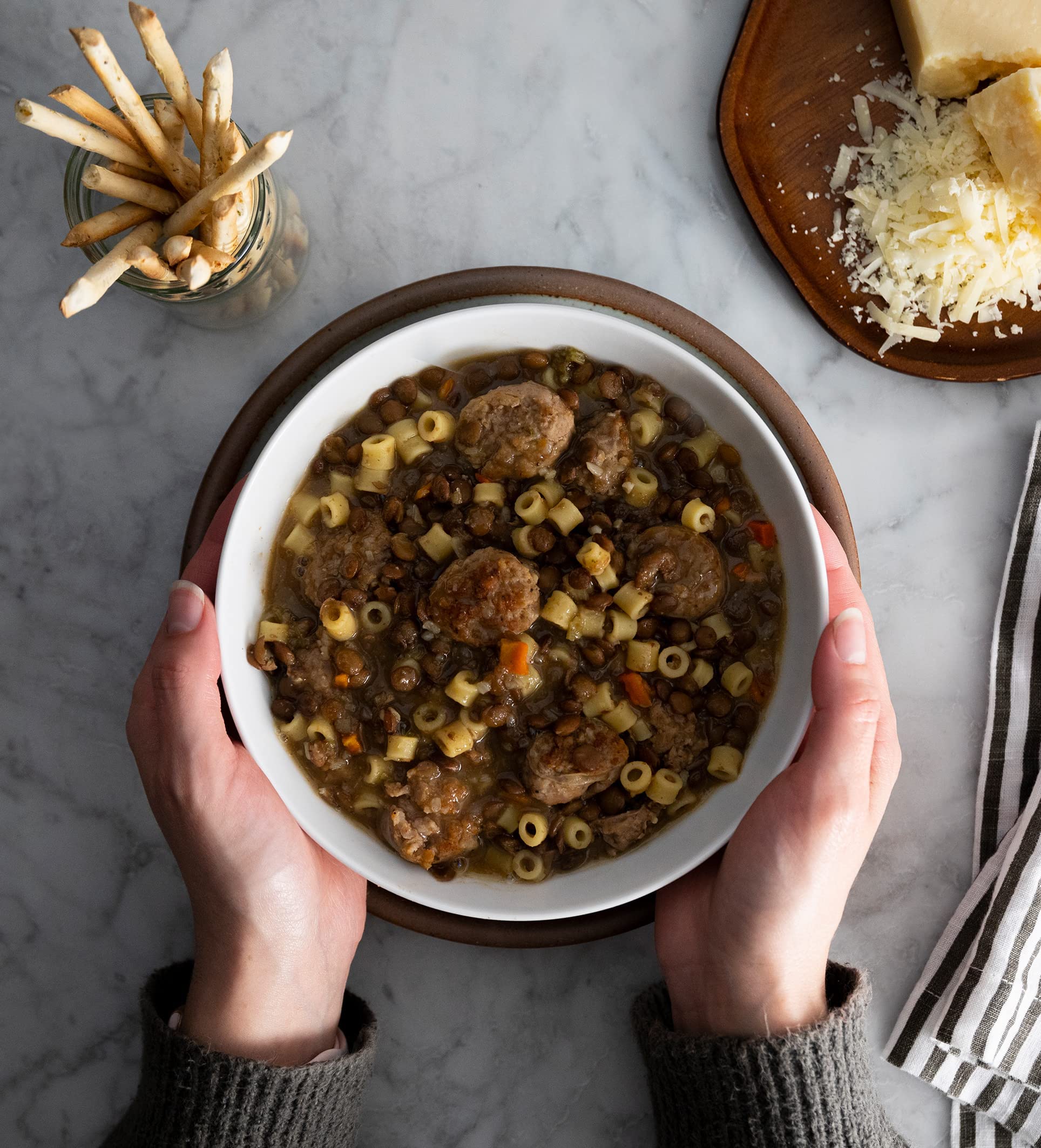 Alessi Sicilian lentil soup cooking on the stove for easy weeknight prep.