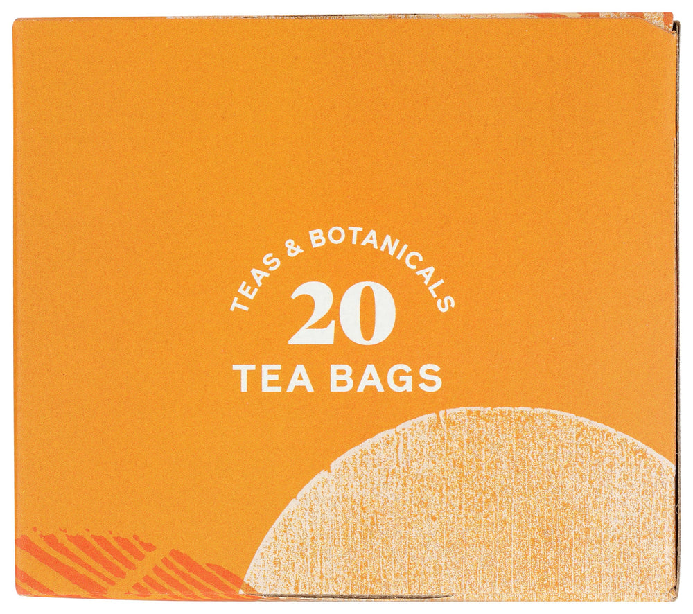 Brewed Allegro Tea cup with peach and ginger aroma inviting relaxation.