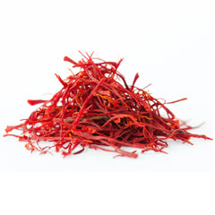 Paella pan shown with Alma Gourmet saffron for iconic golden hue