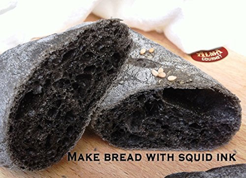 Alma Gourmet squid ink on pasta plate for striking presentation.