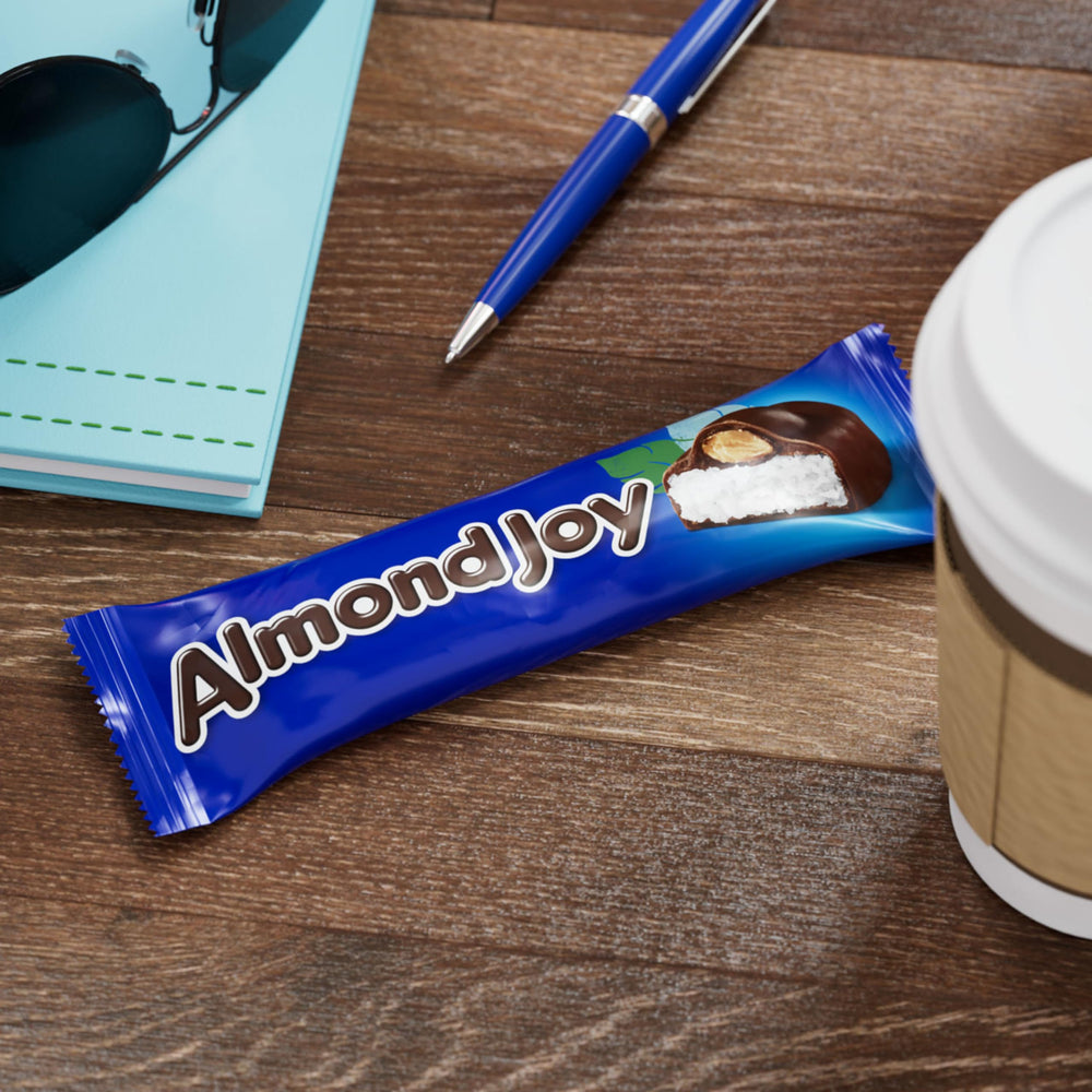 Bulk box display of Almond Joy packs for events.