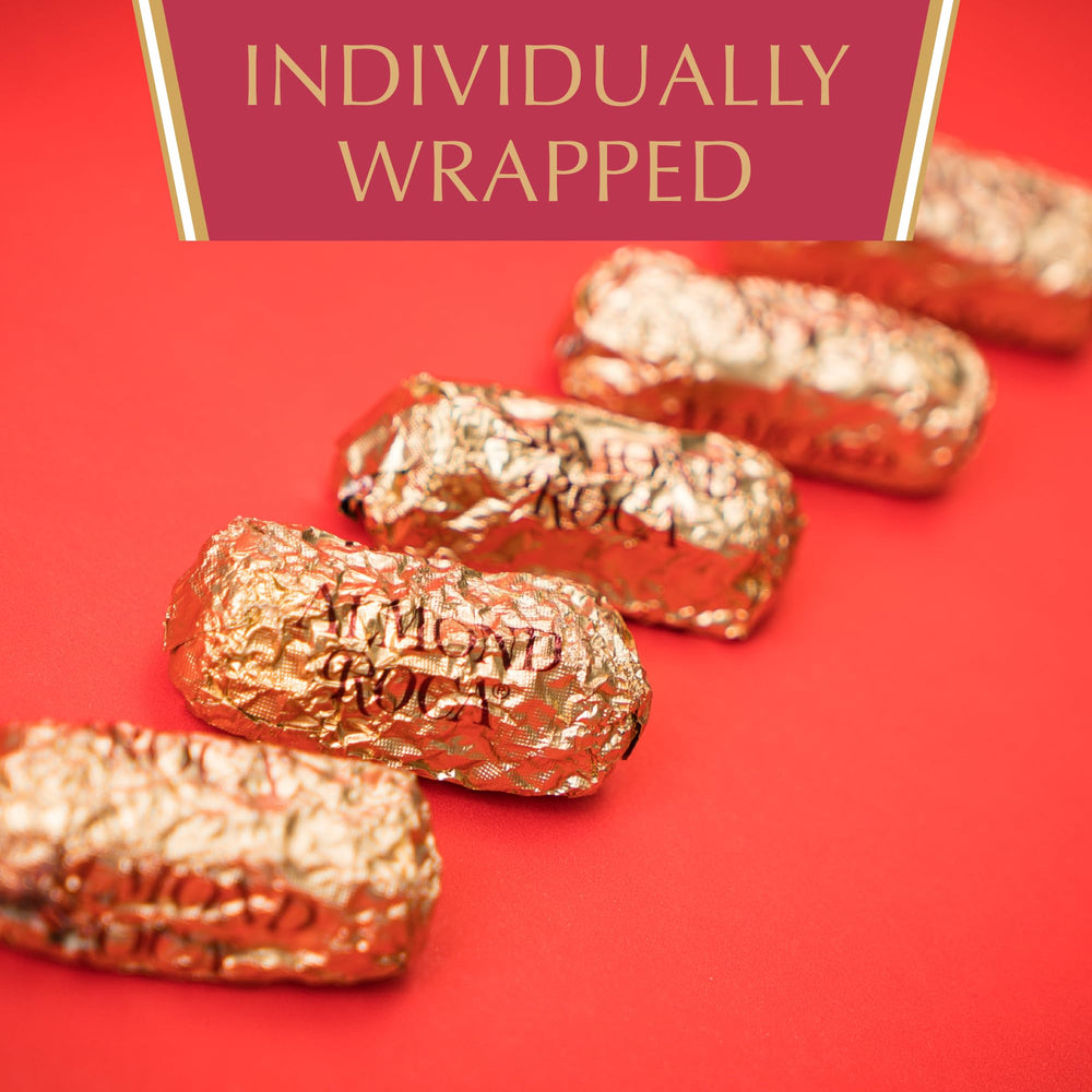 Almond Roca buttercrunch squares closeup exposing crunchy toffee layers