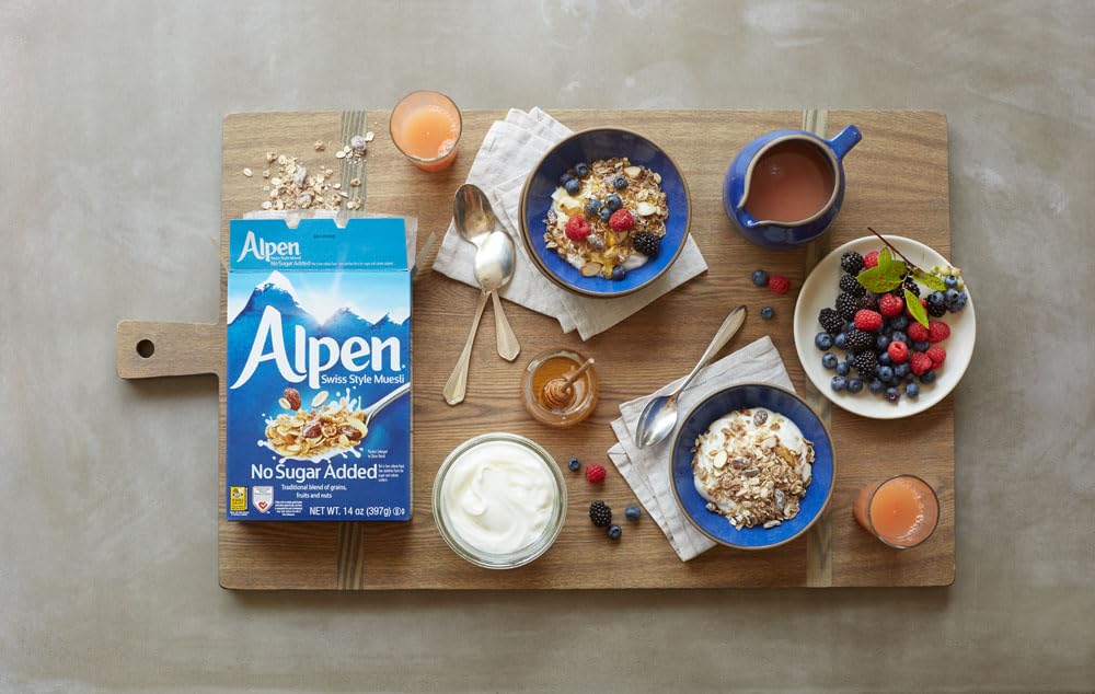 Alpen Muesli No Sugar Added served with milk and fruit.