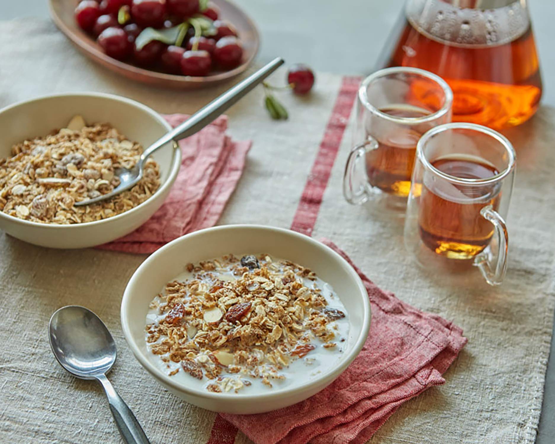 Yogurt parfait with Alpen Original Muesli and fruit for a balanced morning.