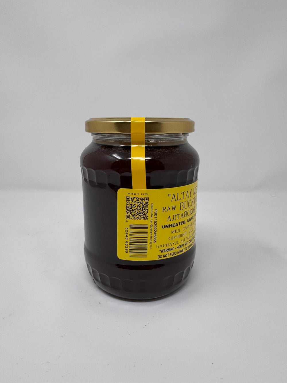 Altay Meadows Buckwheat Honey bottle on a kitchen shelf, signaling ethical sourcing