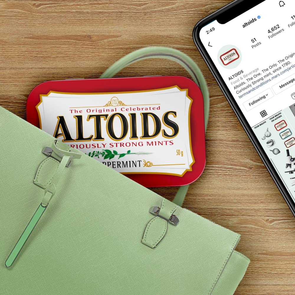 Altoids breath-freshening mints on the desk for daily use.