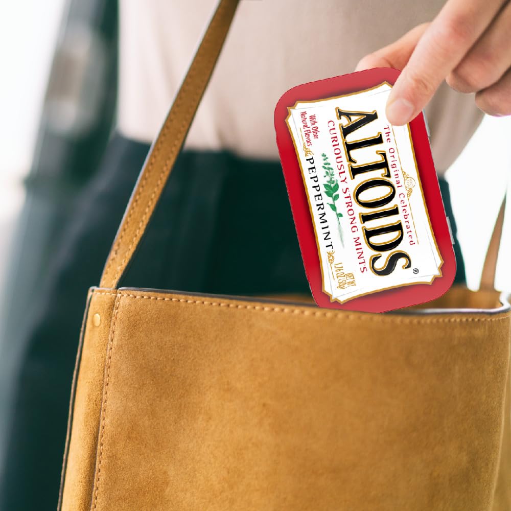 ALTOIDS Classic Peppermint tin beside coffee, ready to refresh conversations.