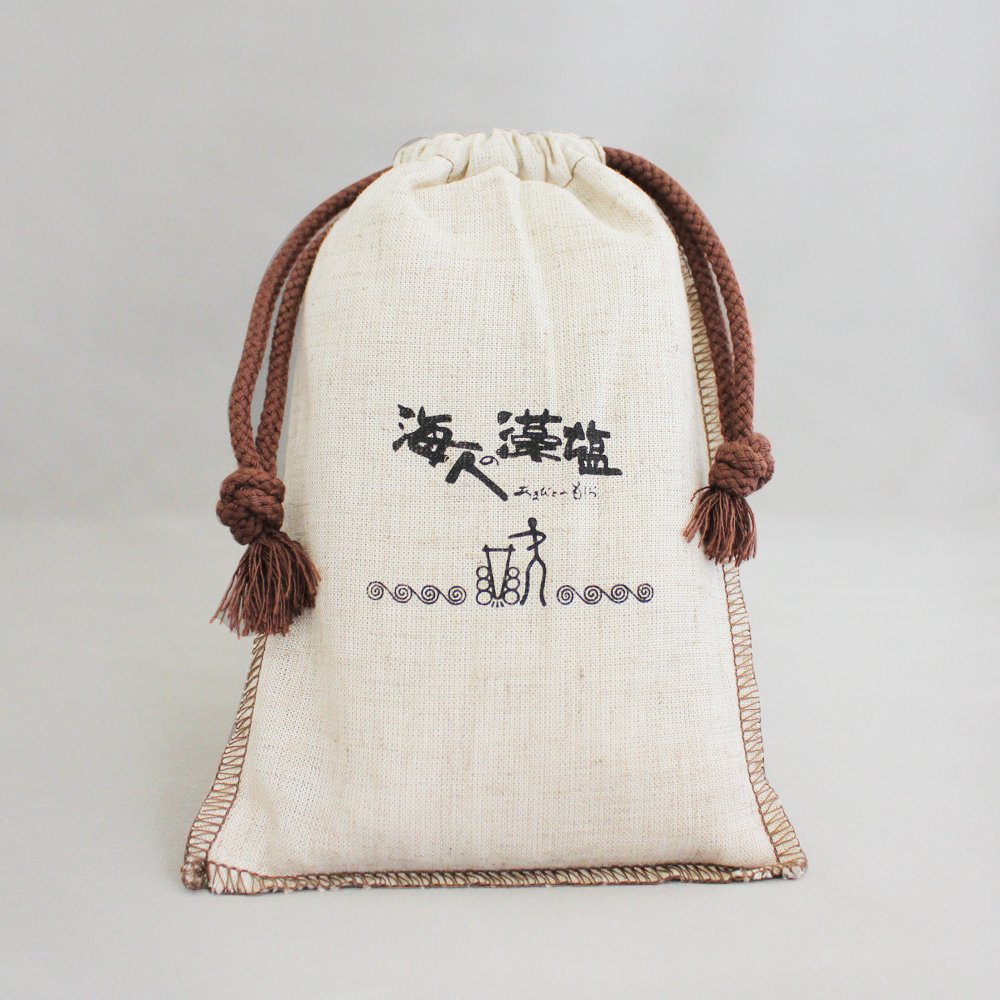 Amabito No Moshio seaweed salt jar boosts umami flavor for everyday cooking.