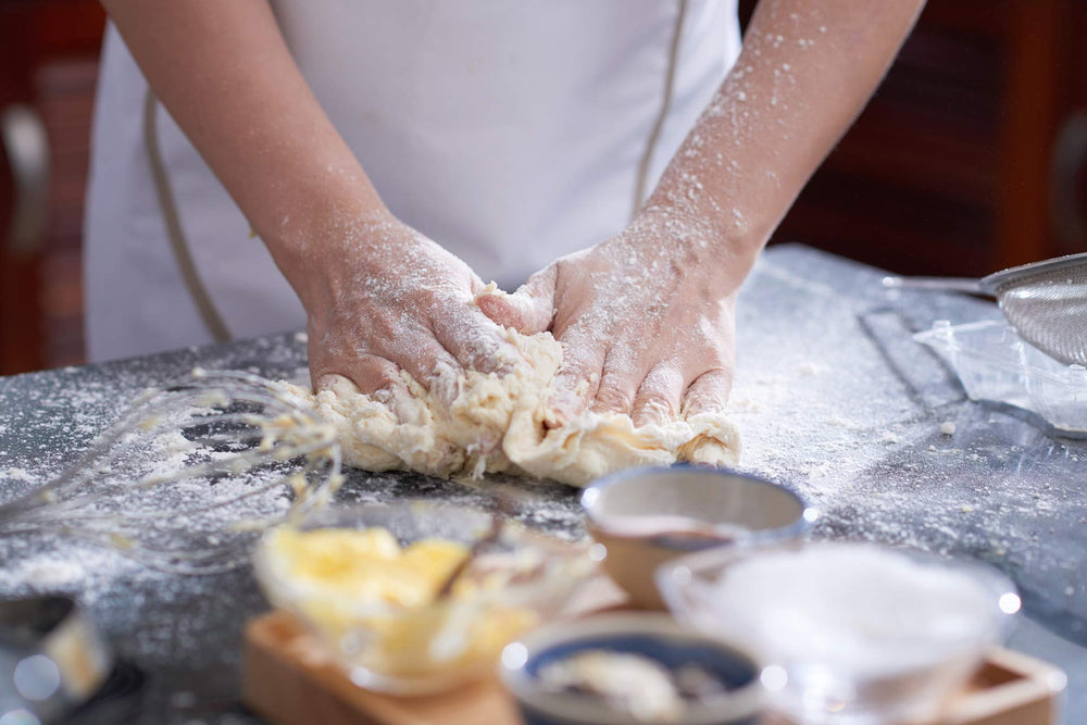 Amafil cheese bread mix in oven-ready form promising warm, golden crust.