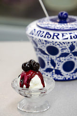 Amarena Fabbri cherries used as dessert topping for gelato and cheesecake.