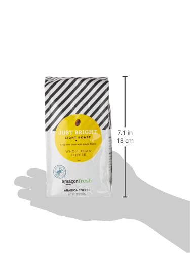 Packaging display of Amazon Fresh Just Bright Coffee signaling quality and Arabica origin