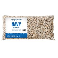 Amazon Fresh Navy Beans 16 oz pack on shelf, ideal for budget-friendly weeknight meals.