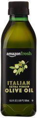 Amazon Fresh olive oil pour shows smooth stream ideal for high heat frying and sauteing.