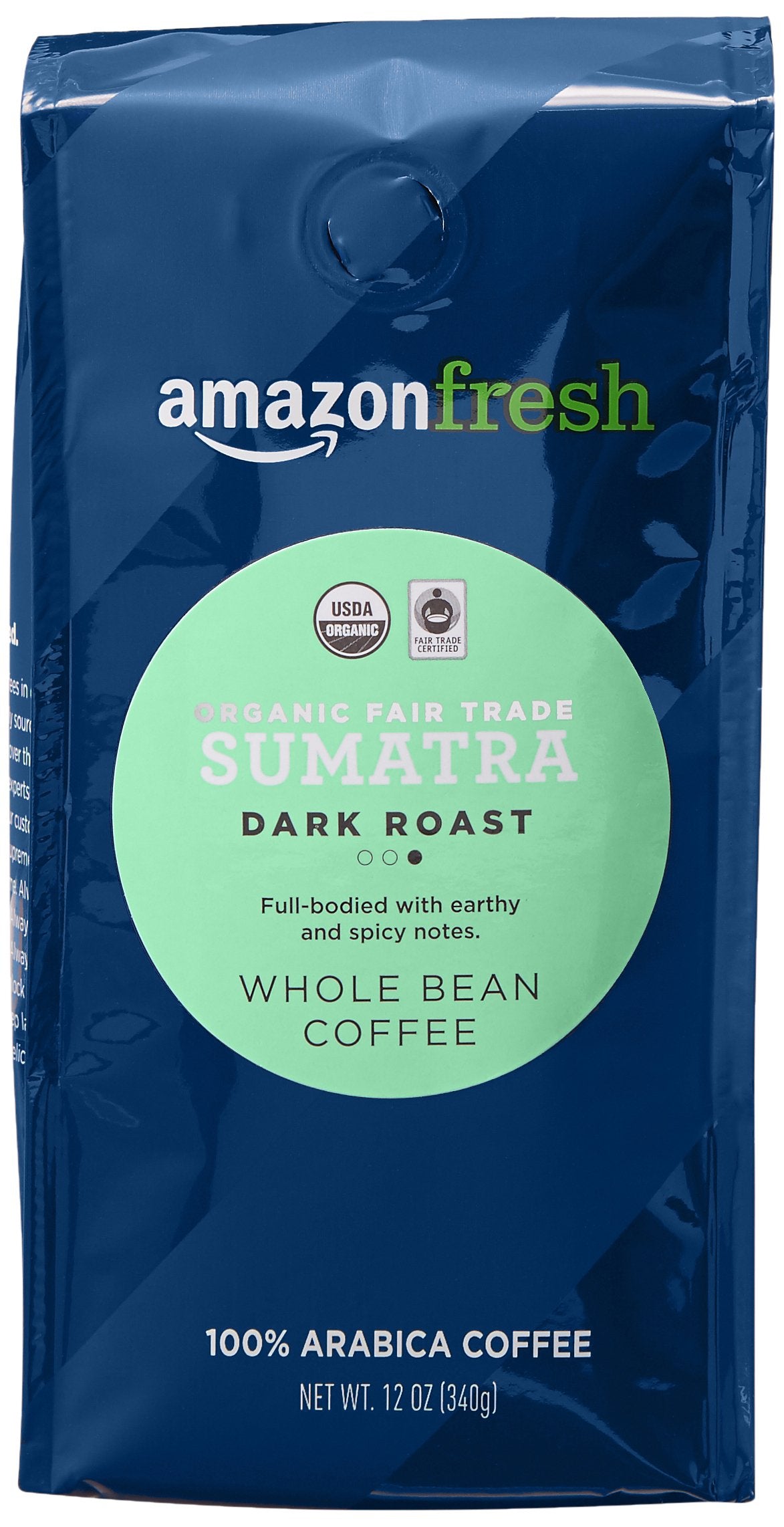 Amazon Fresh Sumatra whole bean coffee close-up with deep dark roast aroma.
