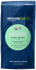 Amazon Fresh Sumatra whole bean coffee close-up with deep dark roast aroma.