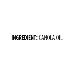 Amazon Grocery Canola Oil 48oz bottle on kitchen counter for meals.