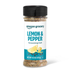 Amazon Grocery Lemon & Pepper seasoning bottle closeup highlights bright citrus aroma for everyday meals.