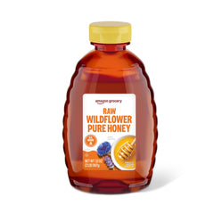 Amazon Grocery raw wildflower honey 2lb bottle close-up for tea and baking.