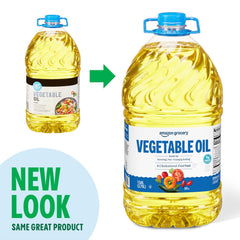 Amazon Grocery vegetable oil on kitchen counter beside spices.